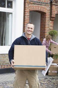 Man and van loading furniture for a move in Snaresbrook